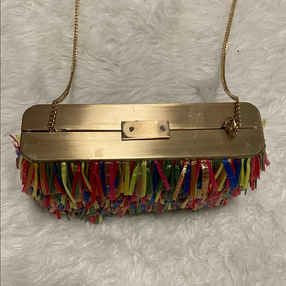 Olga Berg Carlita Carnivale multi-color raffia fringe clutch gold-tone chain.